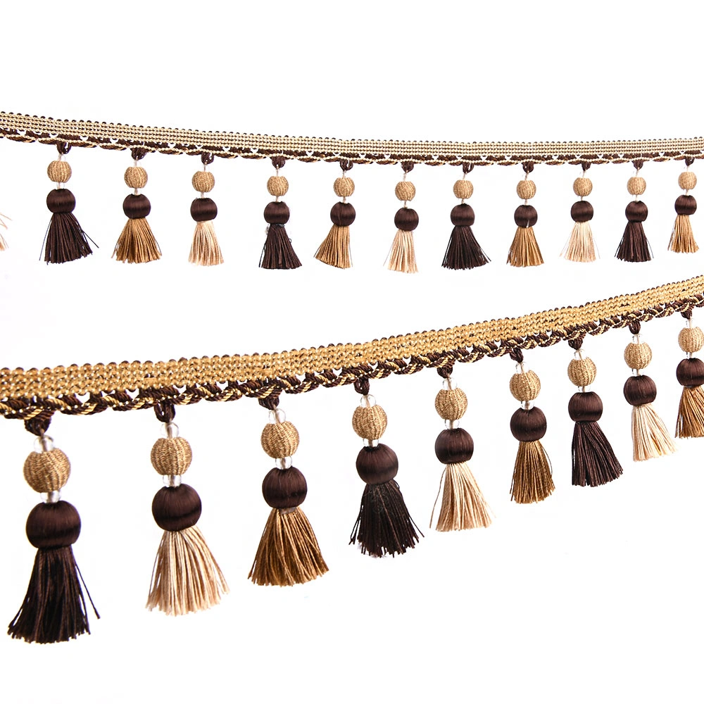 Pom pom fringe trim applied to a curtain leading edge