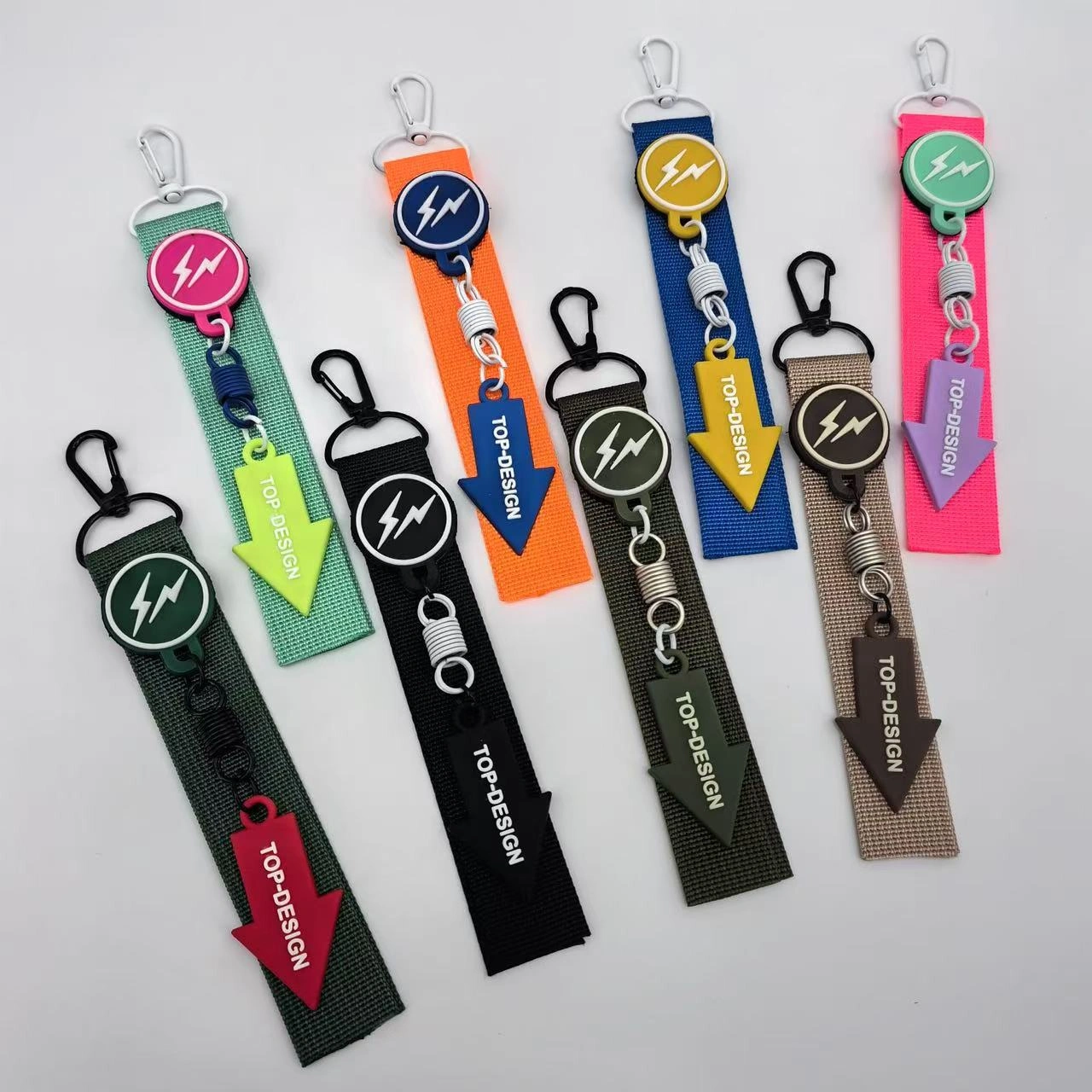 Lightning tag and arrow charm on a webbing strap