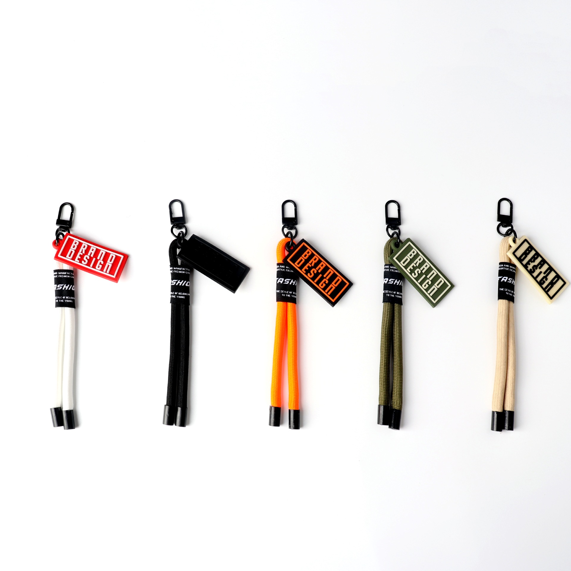 Rubber brand tag charm on a rope lanyard