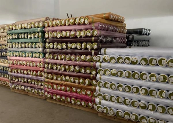 Bridal satin fabric applications in Ghana for dresses decoration and accessories