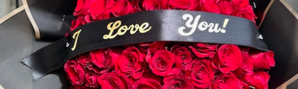 Valentine ribbons, heart balloons and pastel wrapping