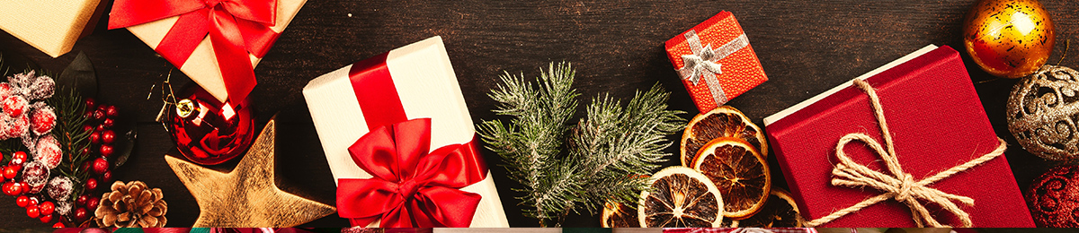 Christmas wreaths, ornaments, and table decorations on a neutral background Christmas wreaths, ornaments, and table decorations on a neutral background