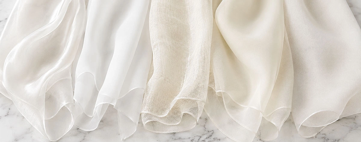 Five chiffon fabric swatches showing silk, polyester, cotton, rayon, and nylon variants