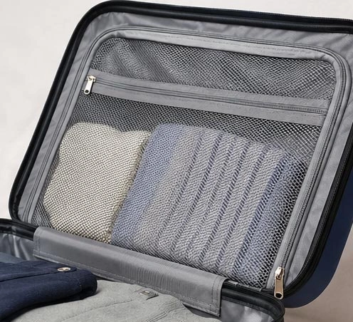 Warp knitted mesh fabric for luggage inner pockets and organizer compartments