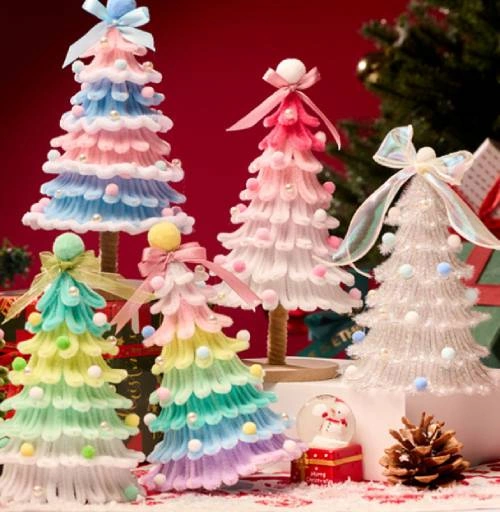 White pipe cleaner and glitter pipe cleaner Christmas tree decorated with colorful pom poms, ribbons, and beads, ideal for DIY Christmas crafts, holiday decorations, table centerpieces, and classroom craft projects.