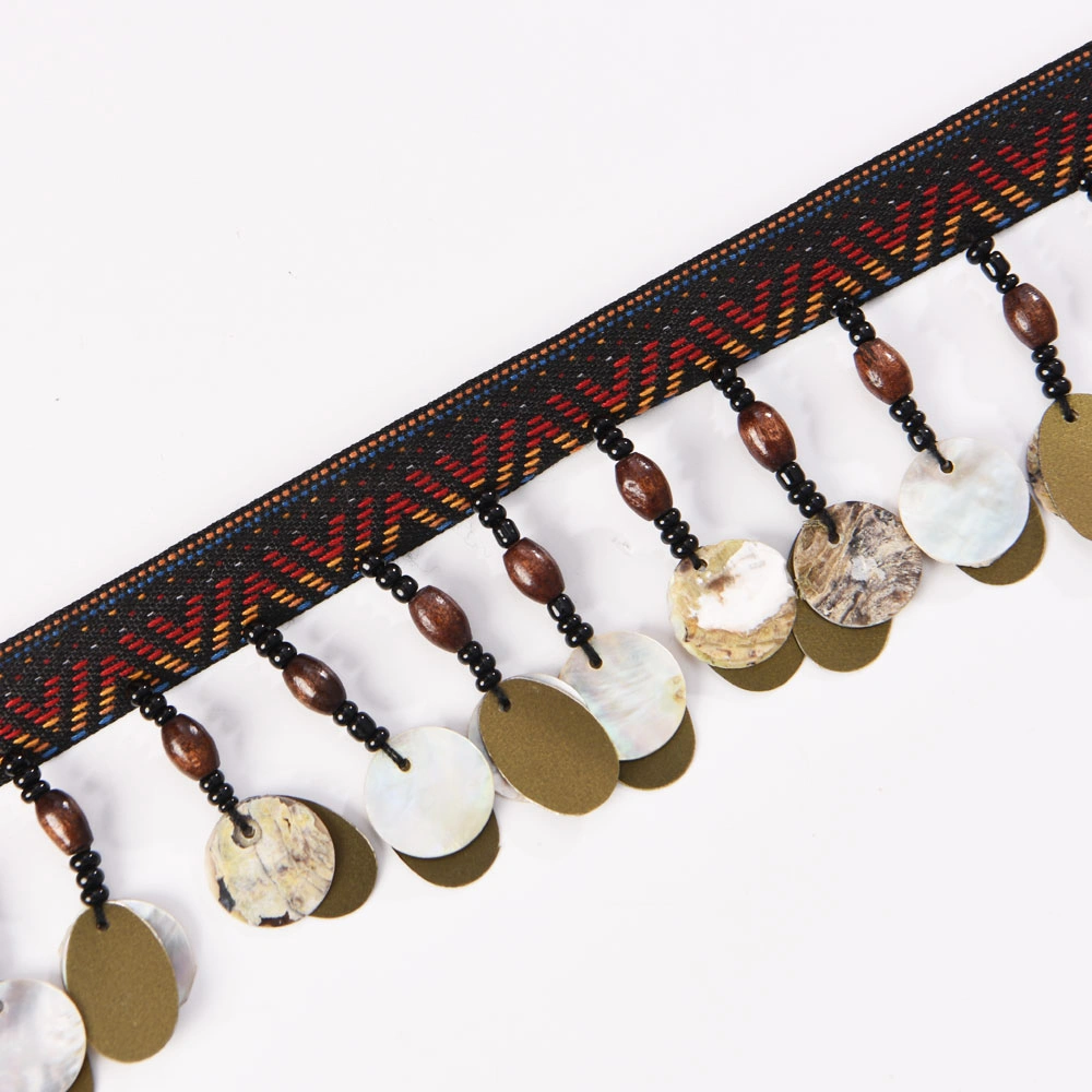 copper coin bead tassel fringe trim displayed on card