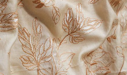 Elegance in Every Stitch: The Allure of Embroidery Silk Fabric